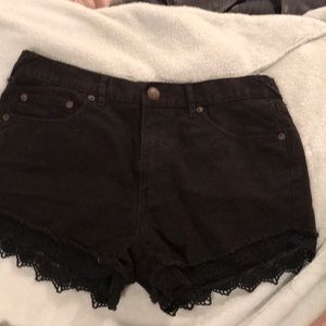 Free People black denim shorts